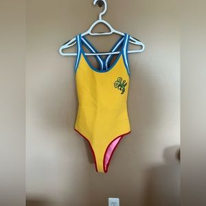 Size medium Triangl one piece. Never worn. Almost like a wetsuit material.